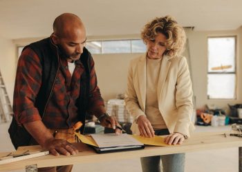 Mature,Contractor,And,Homeowner,Signing,A,Contract,Indoors,For,A